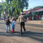 Poros Pagi Sebagai wujud Terbaik Pengamanan masyarakat Dan Para Pelajar Yang uang melintas di jalan raya