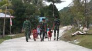 Senyum Anak-Anak Warnai Hasil Pembangunan Jalan Cor 250 Meter TMMD Ke-129 di Kampung Sesor